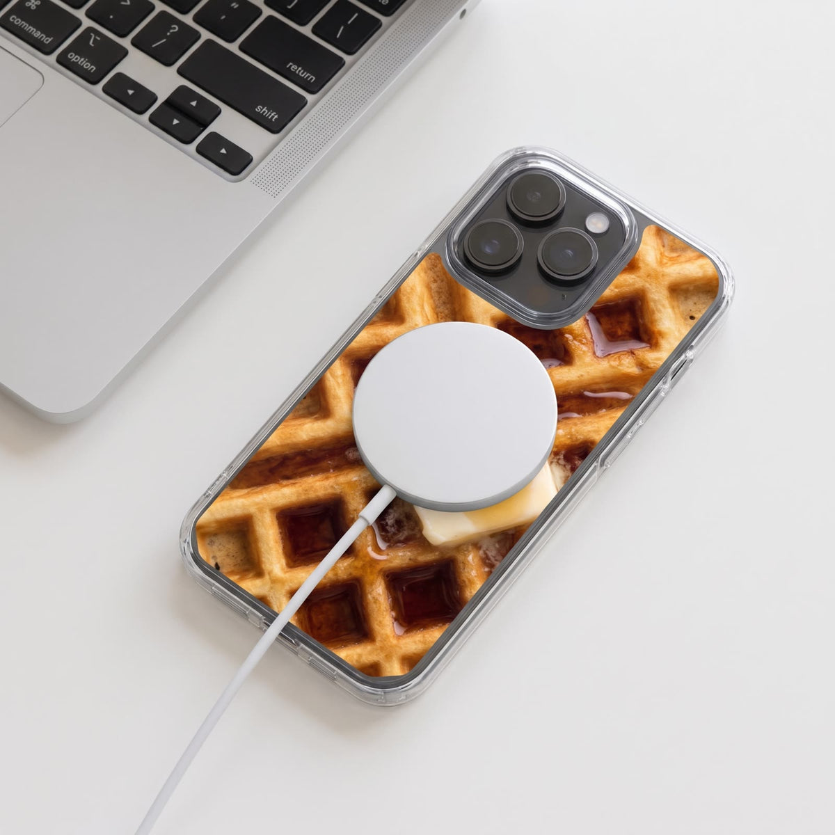 Butter Waffle iPhone Case in the MagSafe case with a charger attached