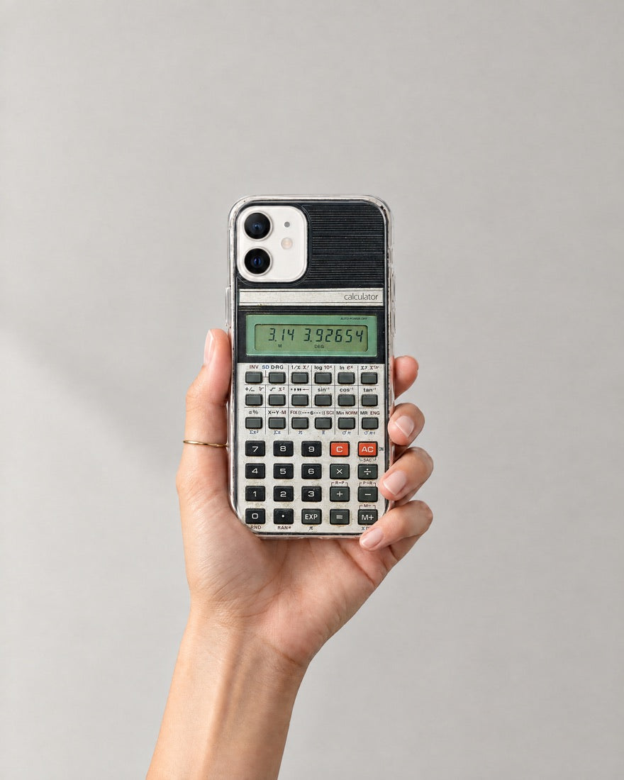 A hand holding the Retro Calculator case