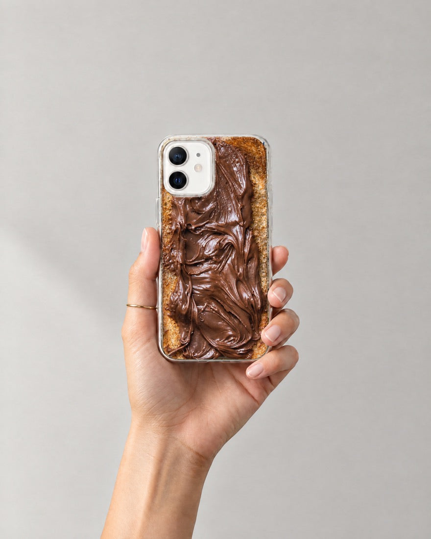 A hand holding the Choco Toast case
