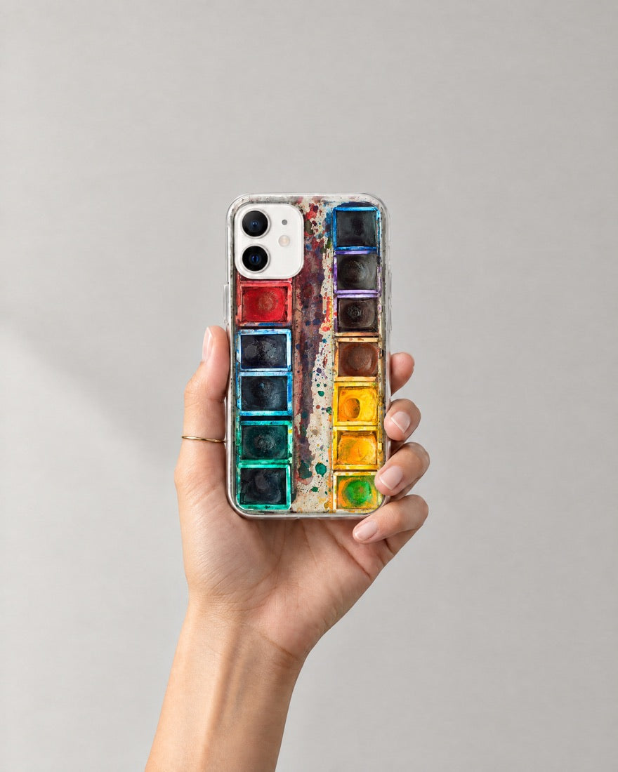 A hand holding the Oil Paint Set case