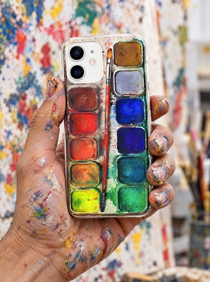 The painter holding the Watercolor Palette case