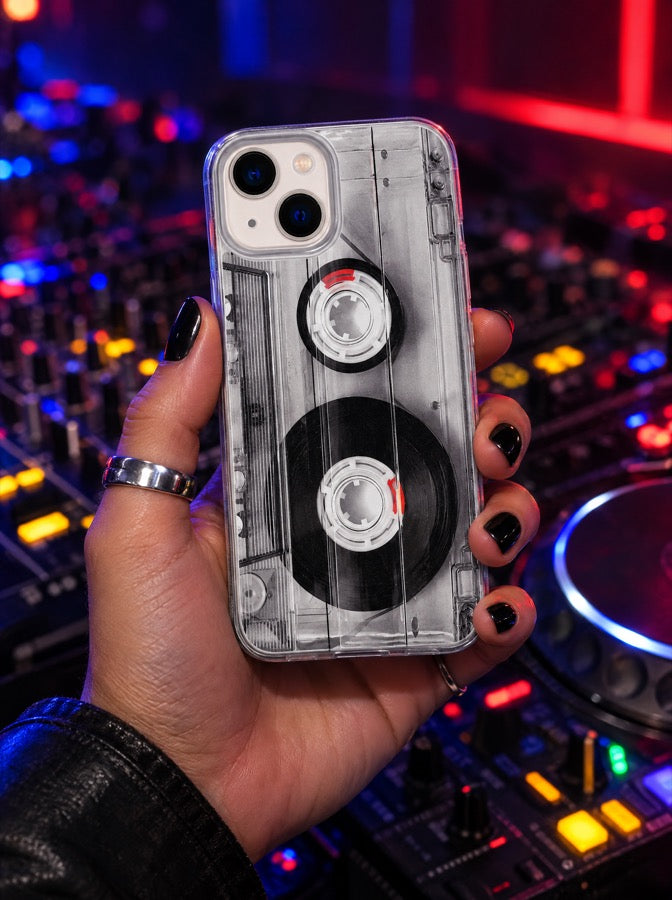 The DJ holding the Cassette Tape case