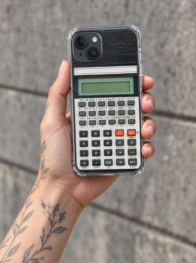 The tattooist holding the Retro Calculator case